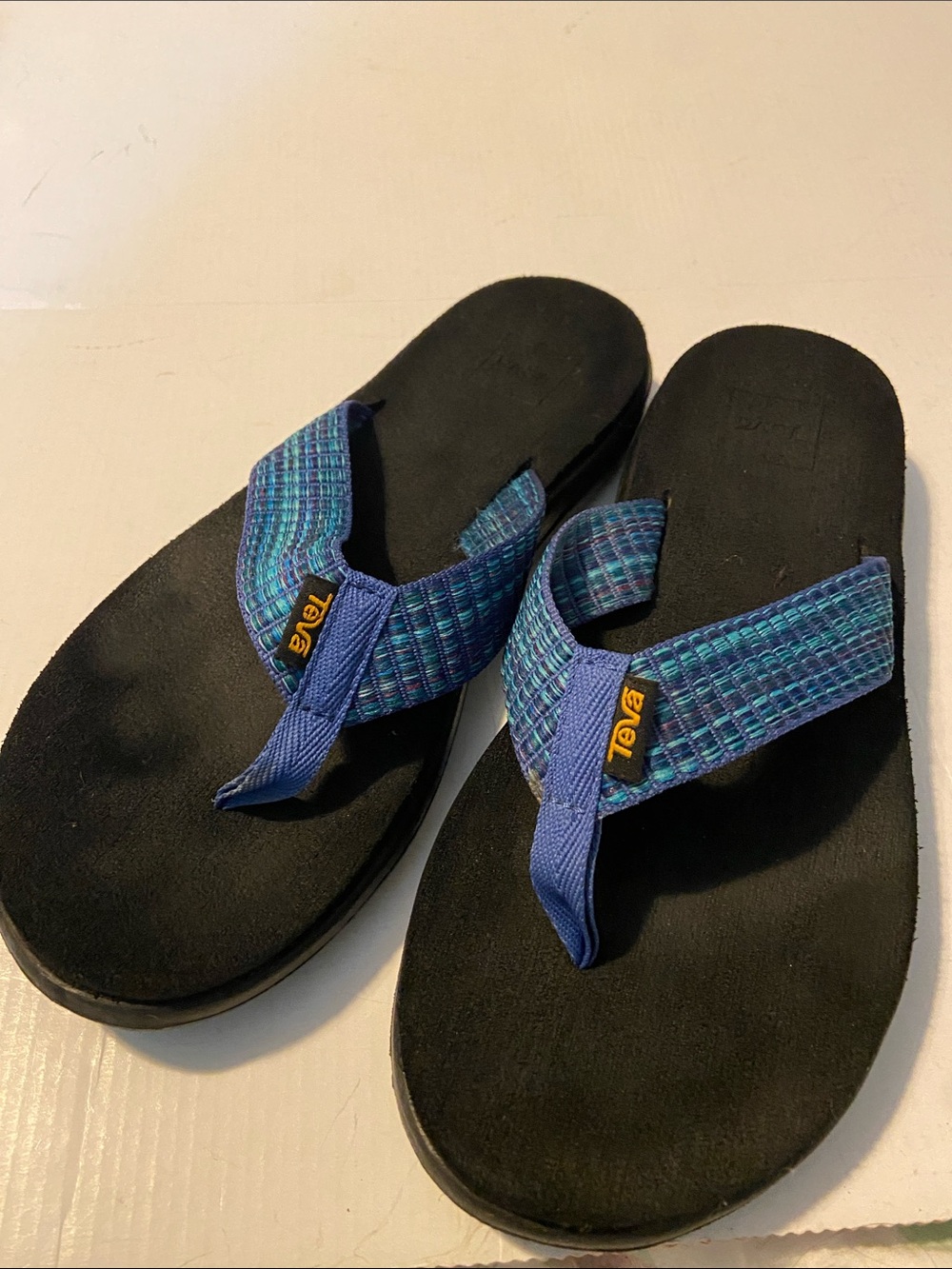 Teva Mush II blue woven flip flops